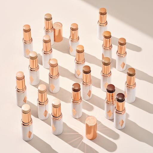 UNREAL SKIN SHEER GLOW TINT HYDRATING FOUNDATION STICK 11 TAN